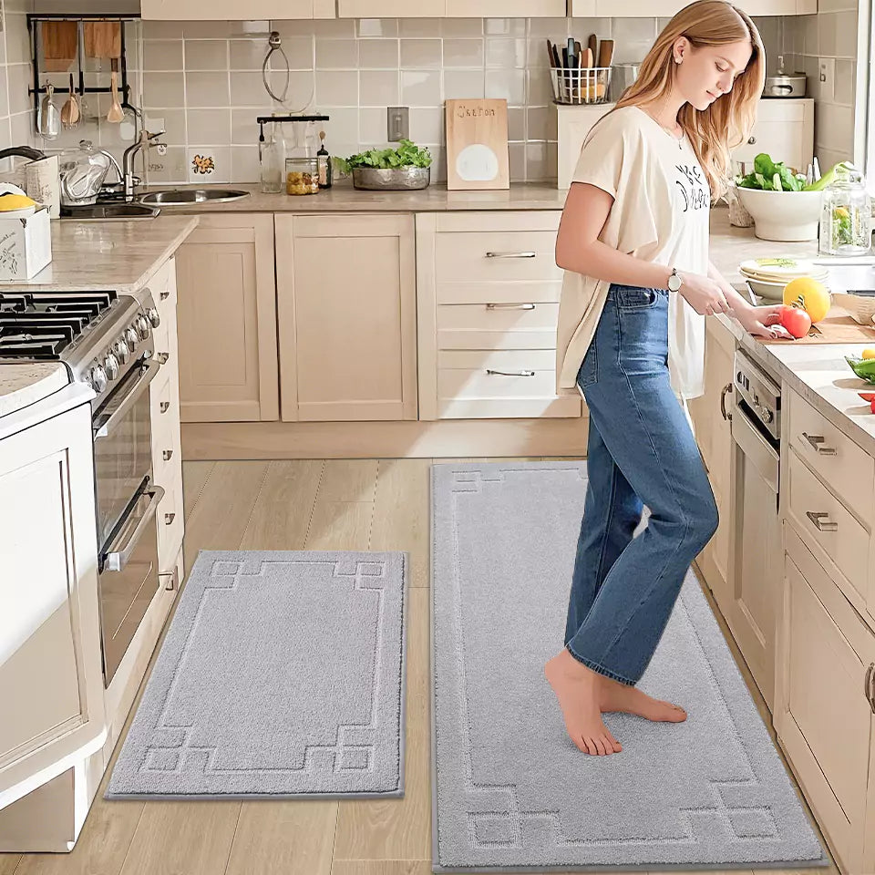 Woman Cooking while Standing on Framed Large Non Slip Kitchen Mats