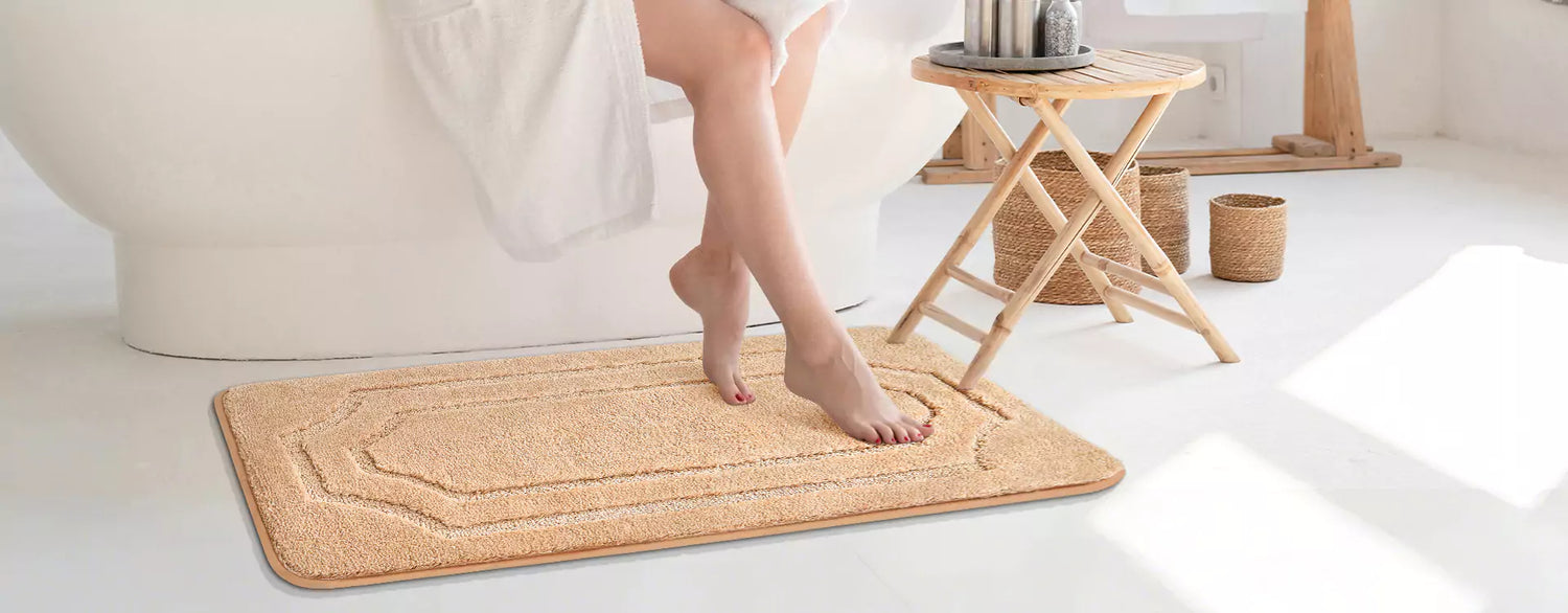 Woman Stepping onto Soft Bath Mats in Front of the Bathtub
