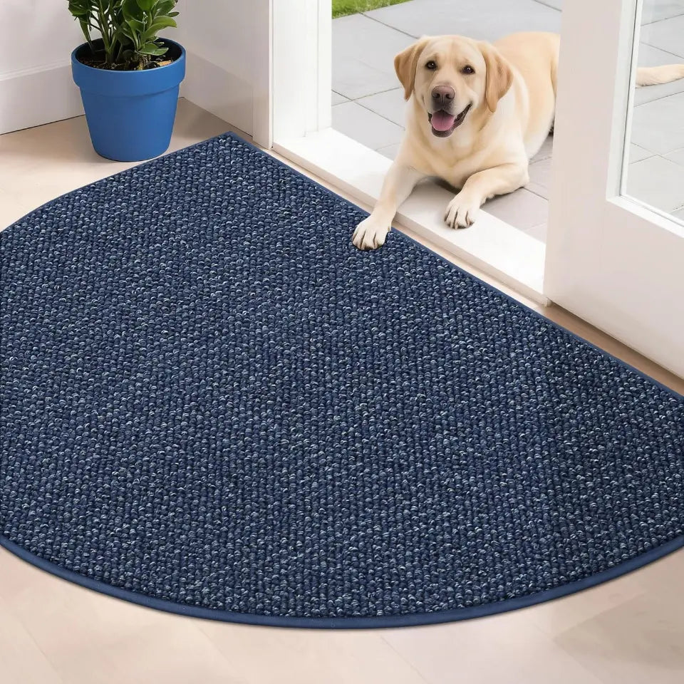 Blue doormat with a dog sitting on a tiled floor
