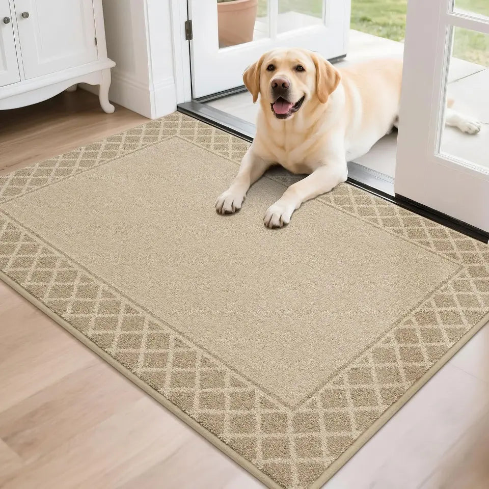 Dog lying on a patterned doormat inside a house