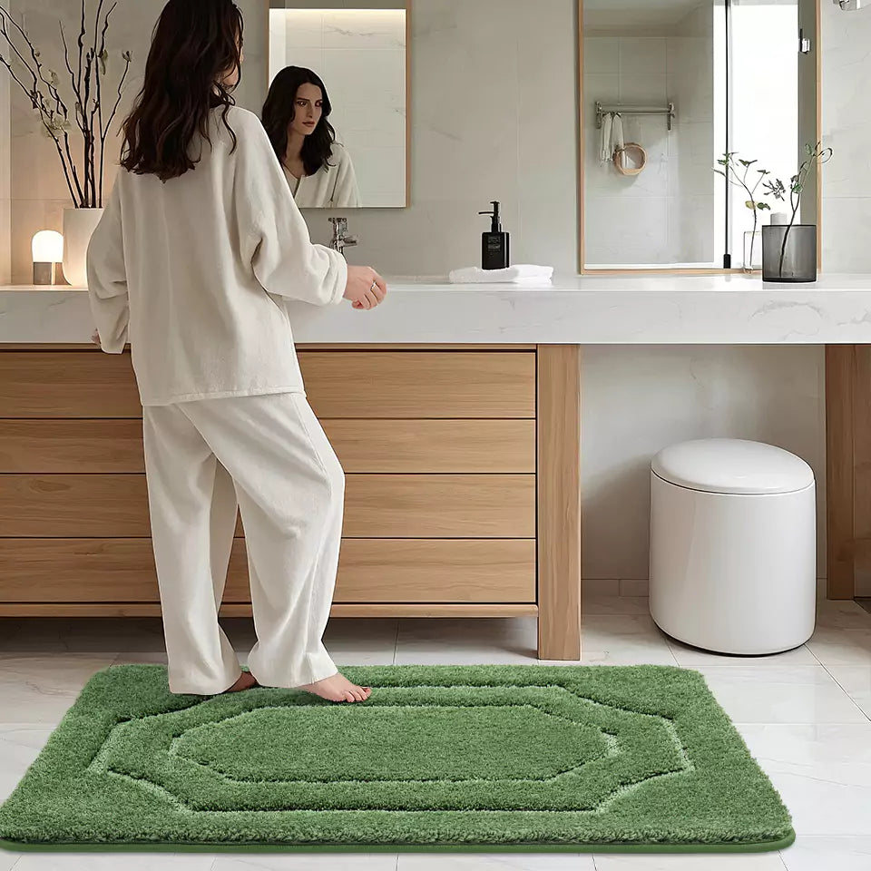 Woman's Foot Stepping on a Green Double Framed Tufted Bath Mat